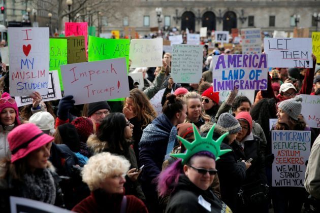 Click to enlarge immigration protestors