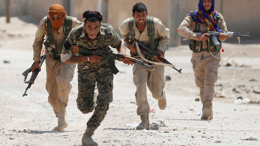 FILE PHOTO Kurdish fighters from the People's Protection Units (YPG)