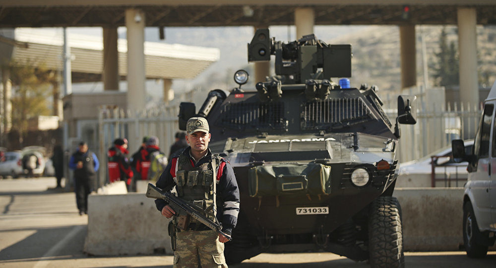 Turkish forces' officers provide security at the Cilvegozu border gate with Syria, near Hatay, southeastern Turkey, Monday, Dec, 19, 2016