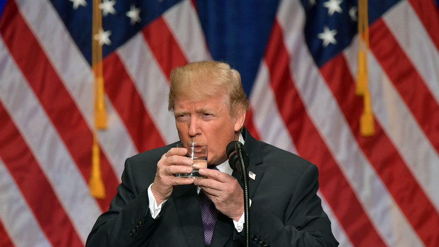 Click to enlarge Trump drinks funny