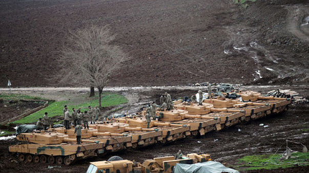Turkish army tanks are seen near the Turkish-Syrian border in Hatay province, Turkey January 23, 2018