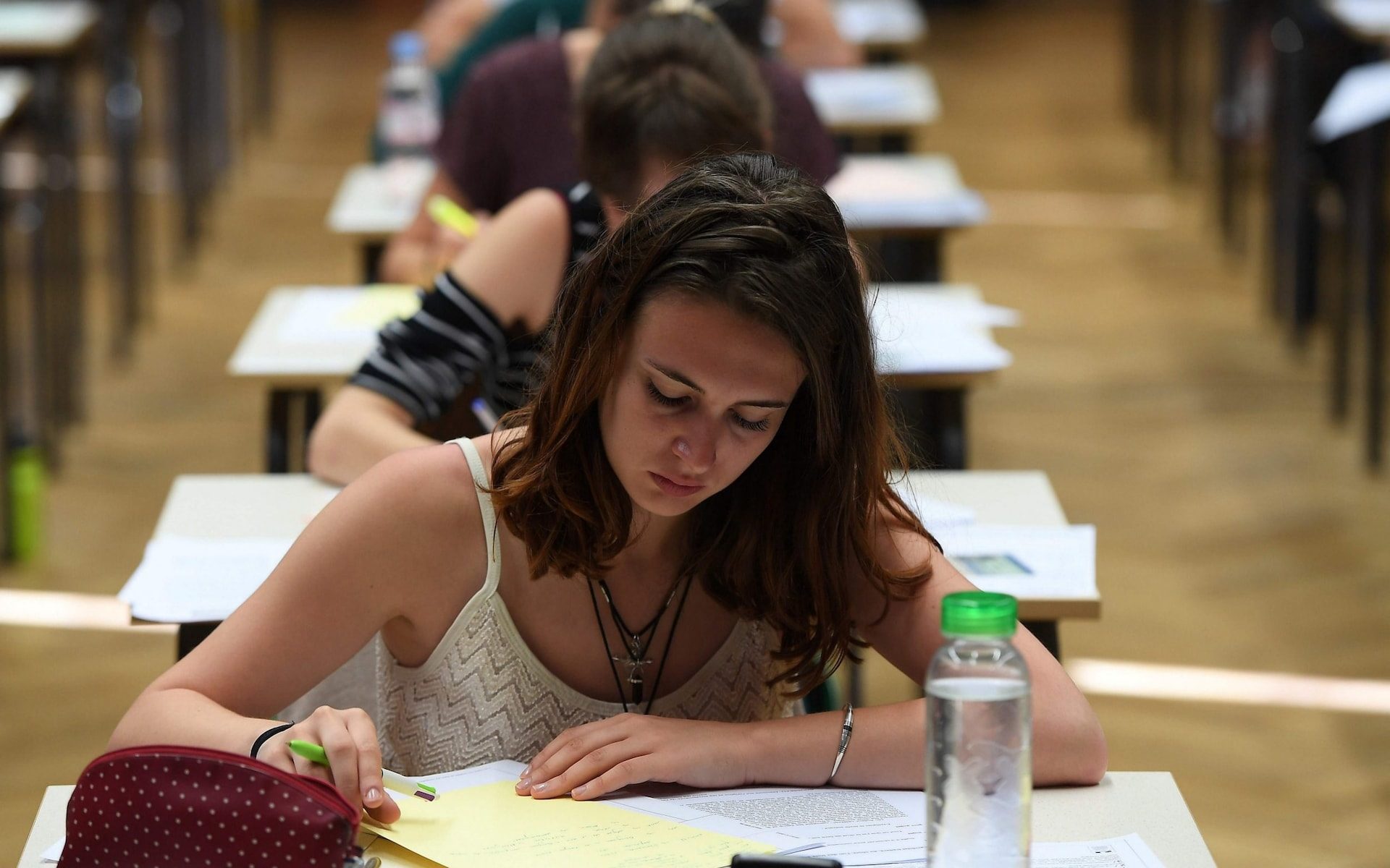 Click to enlarge woman taking exam