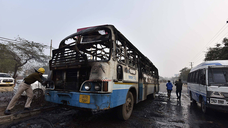 Click to enlarge India bus fire riots
