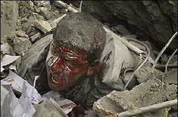 Click to enlarge Man in rubble