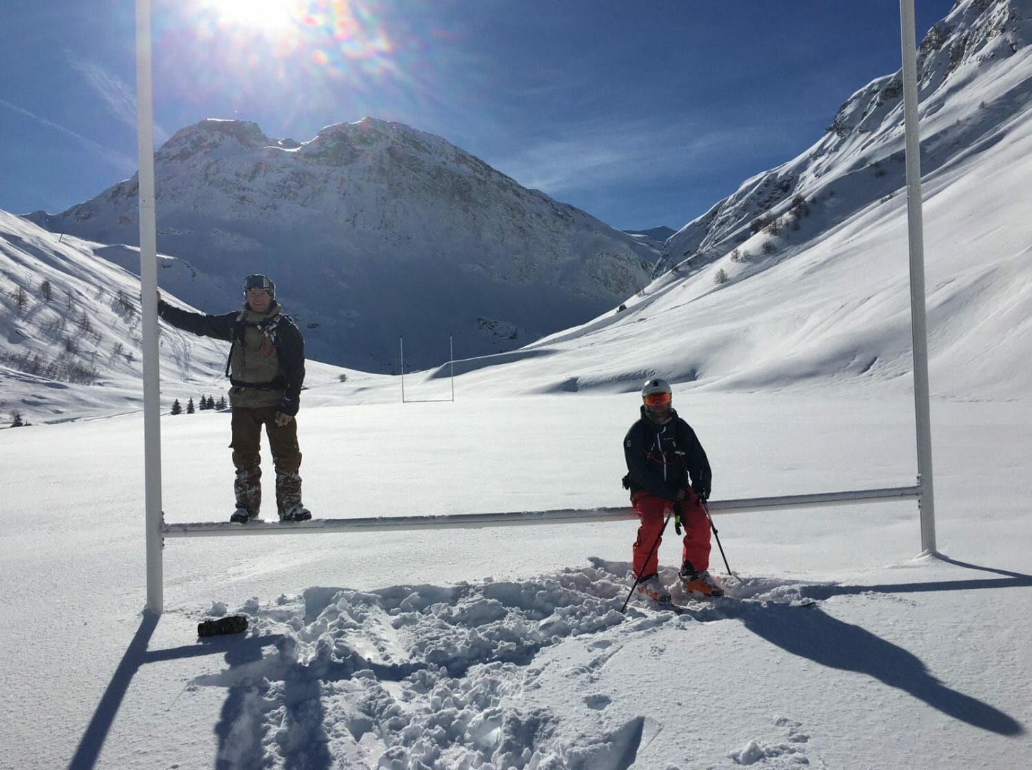 This picture from Marc Cossar and Danny Crompton sitting on the cross bar of rugby posts at Val d’Isere has gone viral.