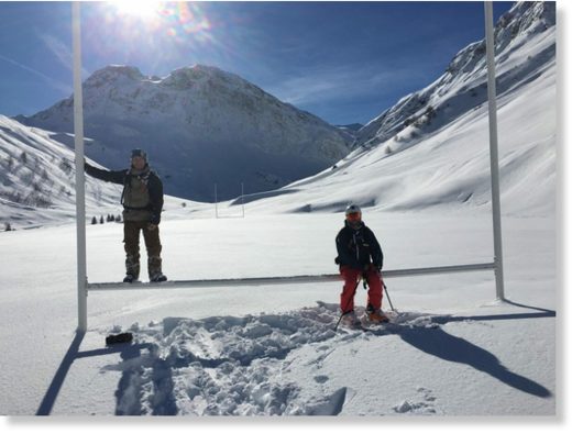 This picture from Marc Cossar and Danny Crompton sitting on the cross bar of rugby posts at Val d’Isere has gone viral.