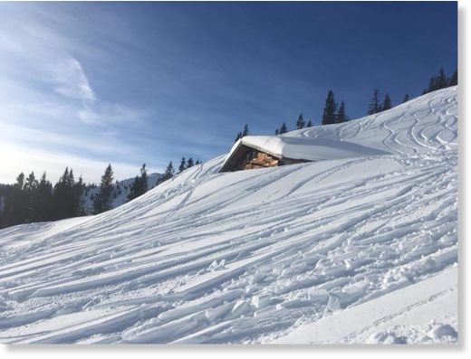 It appears Kitzbuhel measure their snow depth at a point not next to some of their mountain huts, with have been largely buried by the snow.