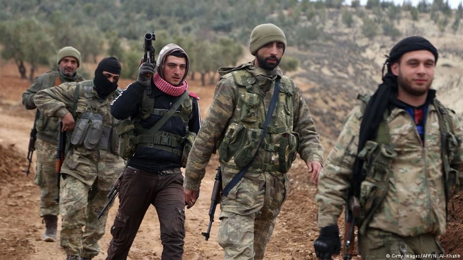 Click to enlarge Turkish-backed Syrian rebel fighters