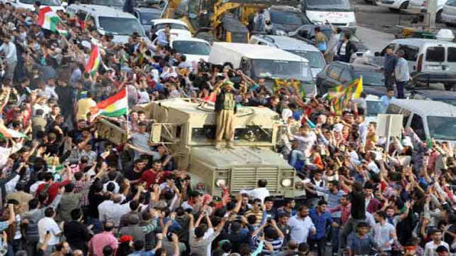 Click to enlarge Kurdish military convoy