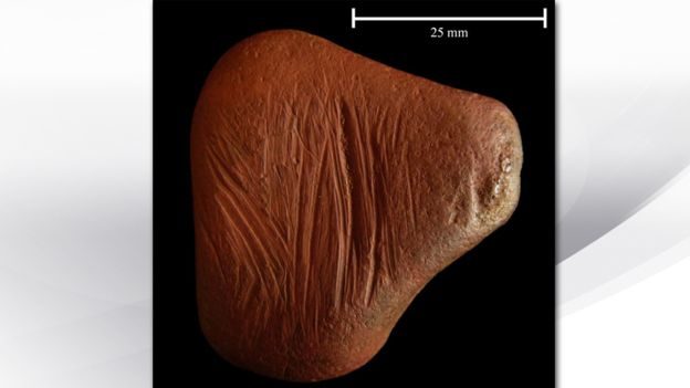 Click to enlarge ochre pebble