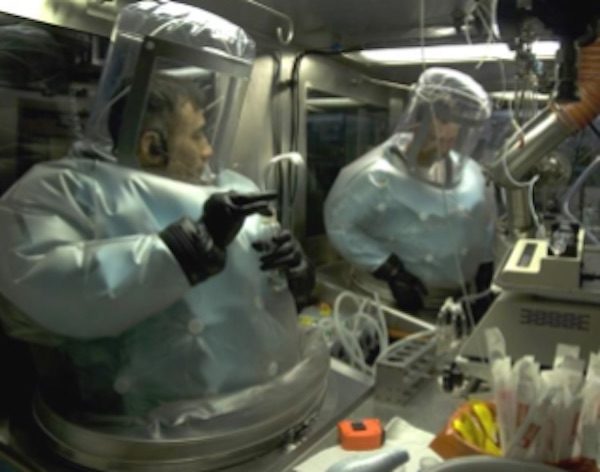 Technicians disseminate live biological agents