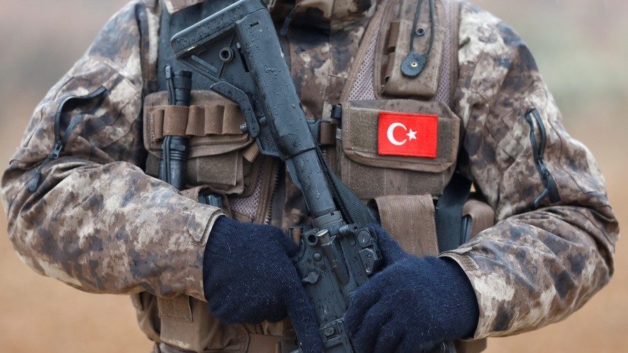 Click to enlarge A member of Turkish police special forces stands guard in Azaz