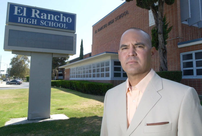 Teacher Gregory Salcido stands in front of El Rancho High School in Pico Rivera after a complaint has been filed against him on Wednesday July 21, 2010.