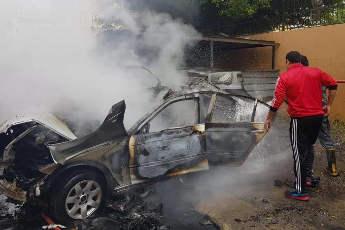 Click to enlarge bombed car