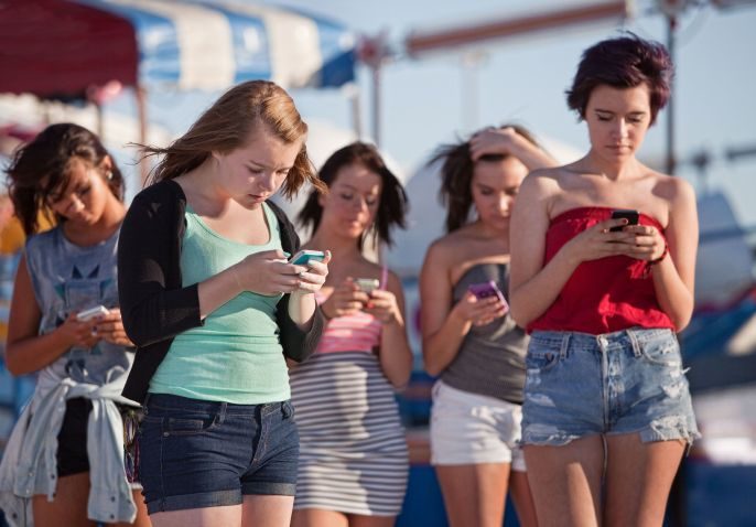Click to enlarge Teens with screens