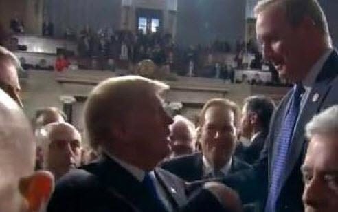 Click to enlarge Trump leaves house chamber after SOTU
