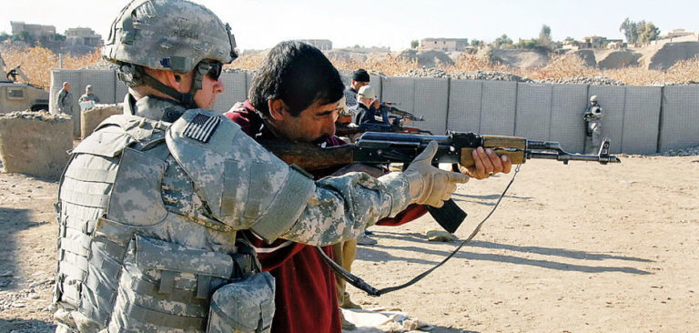 US soldier and Kurdish fighter