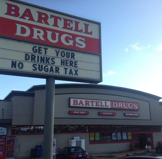 Click to enlarge Sign for tax free soda