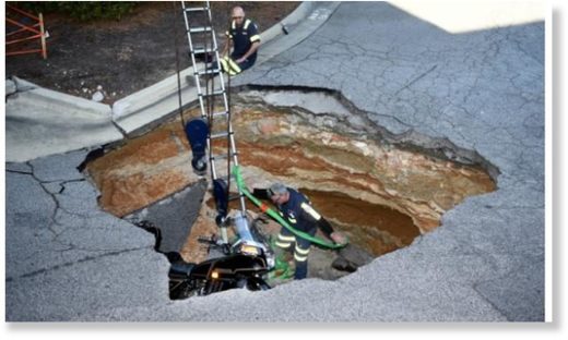 Man, motorcycle fall into Augusta Exchange shopping center sinkhole