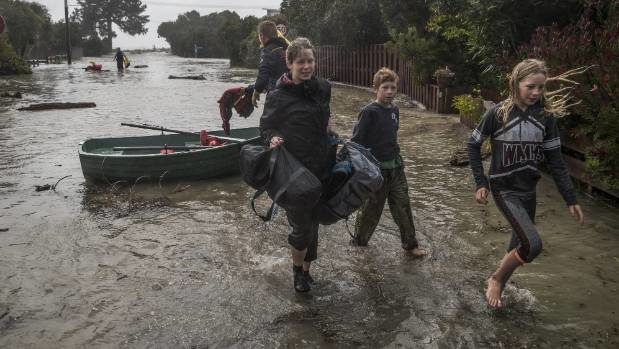 Click to enlarge Families are evacuated in Ruby Bay.