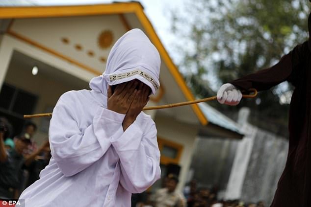 woman whipped sharia indonesia aceh