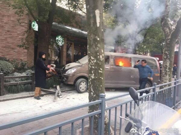 Click to enlarge Car packed with gas canisters rams into pedestrians in Shanghai, China, 18 injured