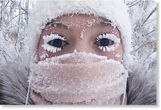 Click to enlarge In this photo taken on Sunday, Jan. 14, 2018, Anastasia Gruzdeva poses for selfie as the Temperature dropped to about -50 degrees (-58 degrees Fahrenheit) in Yakutsk, Russia.