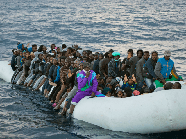mingrants boat raft Mediterranean immigrants