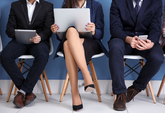 men and woman sitting