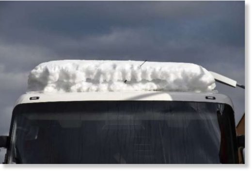 Click to enlarge Police in the Swiss canton of Solothurn stopped the bus after it was seen travelling with a layer of snow more than 40cm thick on the roof.