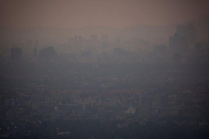 Click to enlarge Smog shrouding Mexico City