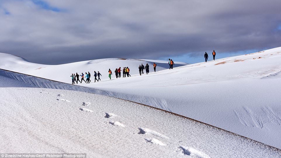 Climb every mountain: The heavy snowfall makes the sand dunes look like snow-covered Alpine mountains