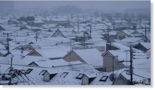 File photo shows roofs of houses covered with snow in Tokyo on Feb 2, 2018.