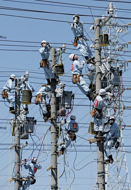 Click to enlarge Happy electricians