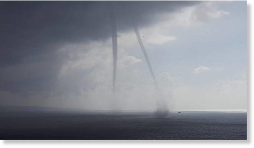 Click to enlarge Two waterspouts appeared this afternoon off Papawai Scenic Lookout near Maui’s South Shore.