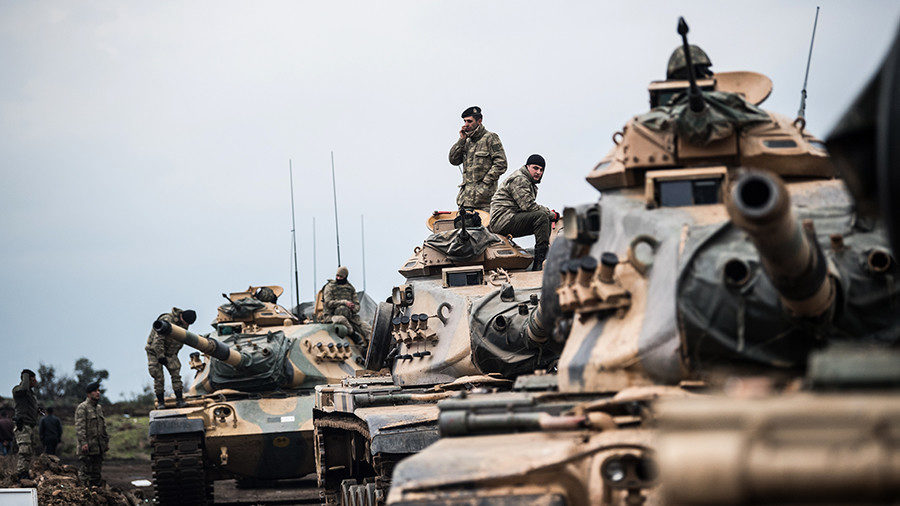 Click to enlarge Turkish army tanks gather close to the Syrian border
