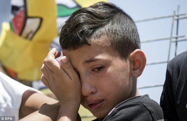 Click to enlarge Palestinian boy