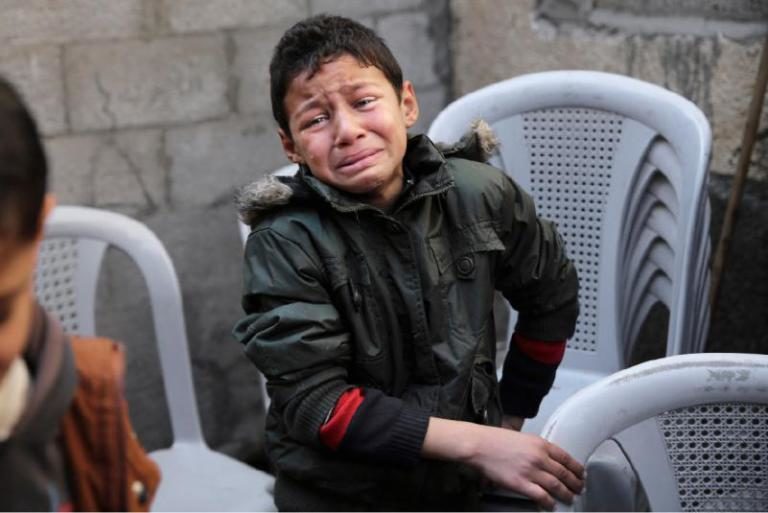 Click to enlarge Palestinian boy