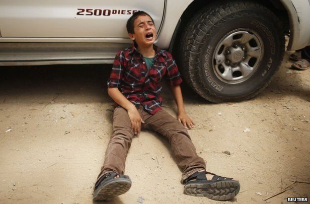 Click to enlarge Palestinian boy Gaza