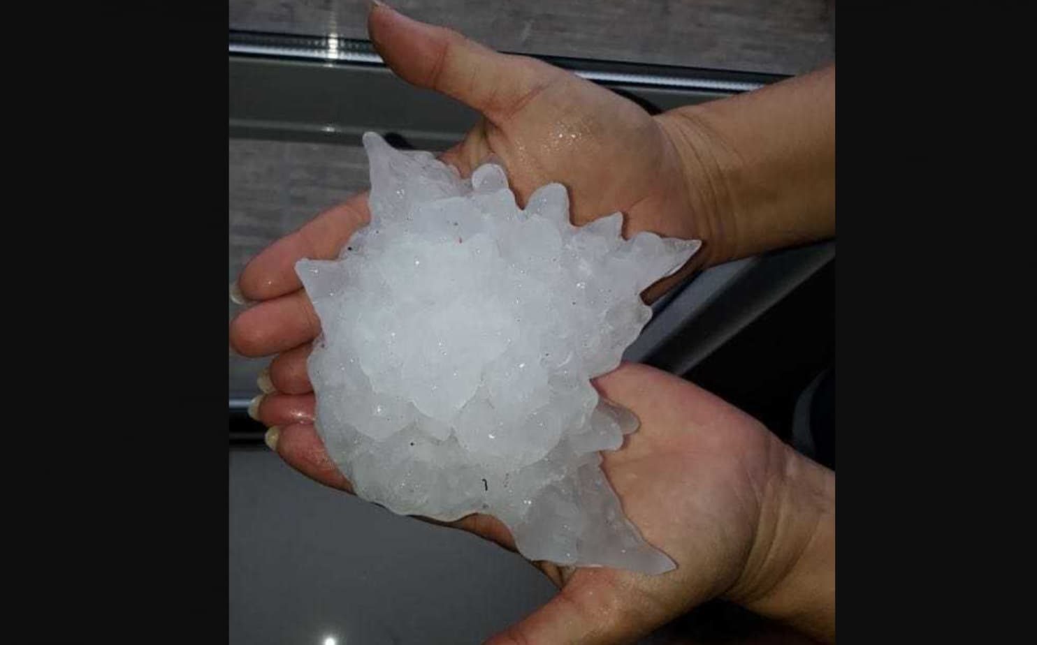 Hail larger than softballs pummeled an Argentina city Thursday