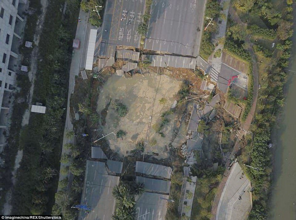 Massive sinkhole swallows eight-lane road in a China, at least eight dead