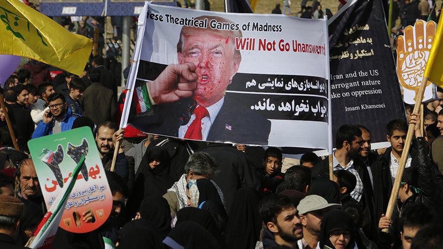 Iranians take part in a rally marking the anniversary of the 1979 Islamic revolution