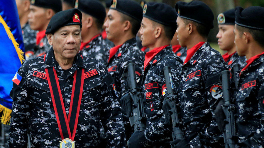 Philippine President Rodrigo Duterte, wearing a military uniform