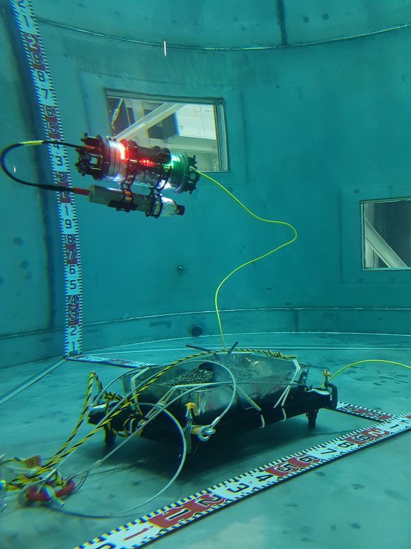 Searching for Simulated Fukushima Fuel Debris Using an AVEXIS TM ROV