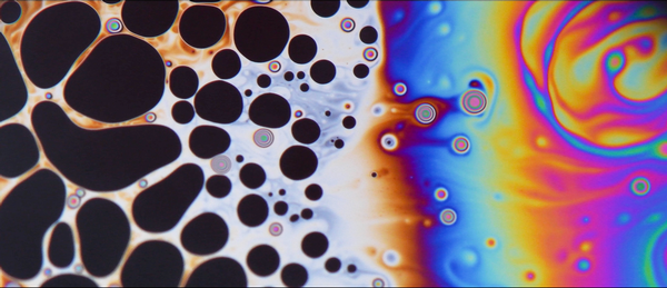 'In a kitchen far far away...' (The fluid instability patterns on top of a soap bubble)