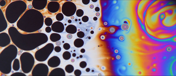 Click to enlarge 'In a kitchen far far away...' (The fluid instability patterns on top of a soap bubble)