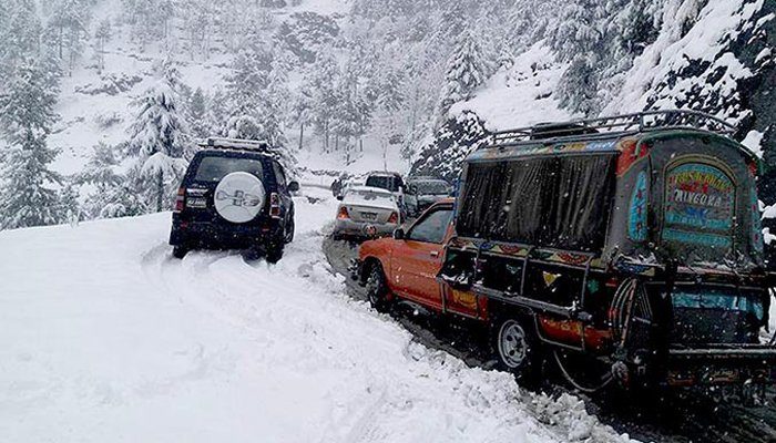 Click to enlarge Vehicles stuck after snowfall in Shangla.