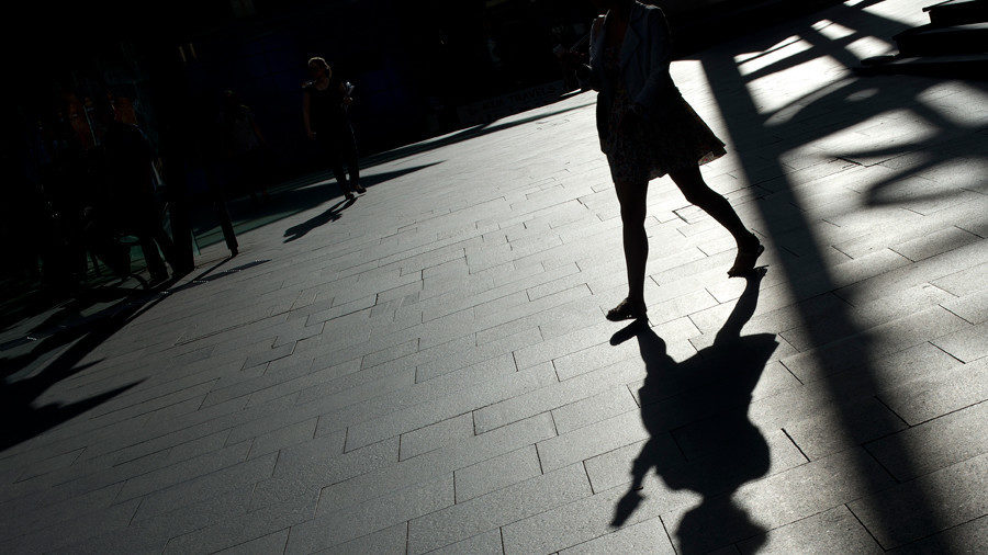 woman walking shadows
