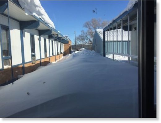 Snow as viewed from inside the school at Box Elder School,