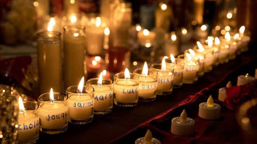 candle light honoring Aaron Feis